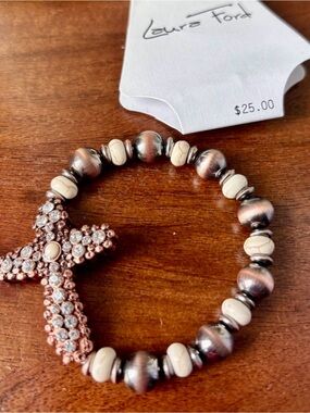 Laura Ford Cross w/small clear stones,ivory & wood beads,stretch-Western trendy